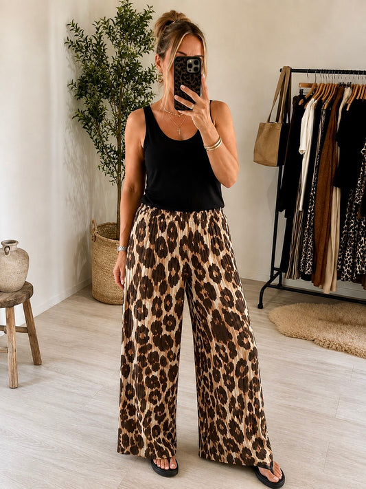 PLEATS PLEASE